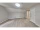 Spacious bedroom featuring neutral walls, carpet, and a white door for a serene living space at 5326 Nader Pl, Stone Mountain, GA 30088