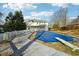 Large backyard with a covered pool and a spacious deck for outdoor entertaining at 360 Wynbrook Dr, Mcdonough, GA 30253