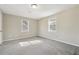 Bedroom with plush carpet flooring, neutral paint, and natural light at 360 Wynbrook Dr, Mcdonough, GA 30253