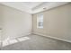 Bright bedroom with neutral walls and carpeted flooring at 360 Wynbrook Dr, Mcdonough, GA 30253