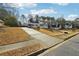 Traditional two-story home with a long driveway and well-manicured front lawn at 360 Wynbrook Dr, Mcdonough, GA 30253