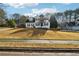 Beautiful two-story home with manicured lawn and mature trees at 360 Wynbrook Dr, Mcdonough, GA 30253
