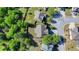 An aerial view of the house showcasing the roof and nearby street at 556 Georgia Cir, Loganville, GA 30052