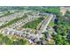 An aerial view of a neighborhood with well-maintained homes and green spaces at 556 Georgia Cir, Loganville, GA 30052