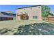 Expansive backyard featuring a covered patio and full wooden fence at 556 Georgia Cir, Loganville, GA 30052