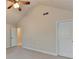 Bedroom featuring large windows with wood blinds, neutral color scheme, vaulted ceiling, and ceiling fan at 556 Georgia Cir, Loganville, GA 30052