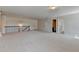 Spacious bonus room featuring carpeted floors, recessed lighting, and staircase with railing at 556 Georgia Cir, Loganville, GA 30052