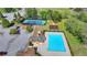 An aerial view of the pool with adjacent tennis courts and ample parking at 556 Georgia Cir, Loganville, GA 30052