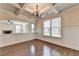 Dining room featuring a coffered ceiling, modern chandelier, and wainscoting at 556 Georgia Cir, Loganville, GA 30052