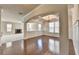 Elegant dining room with hardwood floors, wainscotting, and decorative coffered ceiling at 556 Georgia Cir, Loganville, GA 30052