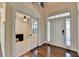 Inviting foyer with hardwood floors offering a glimpse into the office space at 556 Georgia Cir, Loganville, GA 30052