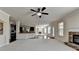 Bright, open concept living area with kitchen, two fireplaces and plenty of room to relax at 556 Georgia Cir, Loganville, GA 30052