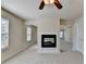 Spacious main bedroom offers a fireplace and lots of natural light at 556 Georgia Cir, Loganville, GA 30052