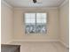 Bright office space with a large window offering ample natural light at 556 Georgia Cir, Loganville, GA 30052