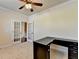 Office space with french doors leading to the home's entry at 556 Georgia Cir, Loganville, GA 30052
