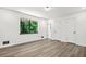 Bright bedroom with hardwood floors and dual closets at 7582 Carlisle Dr, Jonesboro, GA 30236