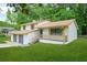 Well-maintained two-story home with a two-car garage and a cozy covered front porch at 7582 Carlisle Dr, Jonesboro, GA 30236