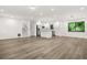 Bright and spacious living room featuring hardwood floors and modern decor at 7582 Carlisle Dr, Jonesboro, GA 30236