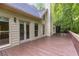 Spacious outdoor deck perfect for entertaining with access to the home's interior at 9395 Clublands Dr, Alpharetta, GA 30022