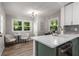 Bright dining area with two windows, white walls, and light flooring, offers an inviting space to dine and enjoy at 2026 Rebecca Ln, Decatur, GA 30032