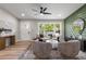 Inviting living room featuring neutral tones, a large window with natural light, and stylish decor at 2026 Rebecca Ln, Decatur, GA 30032