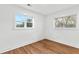Bright room with luxury vinyl plank flooring and natural light from two windows at 2211 Macon Sw Dr, Atlanta, GA 30315