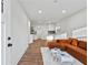 Spacious living area showcases natural lighting, hardwood floors, and open design at 2211 Macon Sw Dr, Atlanta, GA 30315