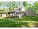 This home includes a large backyard with a deck, lawn and ample space for outdoor activities and entertaining at 3078 Alberta Dr, Marietta, GA 30062