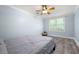 A nicely appointed bedroom with wood-look floors and a ceiling fan at 3078 Alberta Dr, Marietta, GA 30062