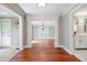 Elegant home entryway with hardwood floors, classic columns, and open floor plan at 3078 Alberta Dr, Marietta, GA 30062