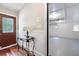 Warm entryway featuring a decorative door, hardwood floors, and access to the garage at 3078 Alberta Dr, Marietta, GA 30062