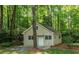Charming cottage-style home nestled in a lush, green wooded area offers peace and privacy at 3078 Alberta Dr, Marietta, GA 30062