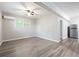 A studio-style living area with sleek floors and a modern mini-split air conditioner at 3078 Alberta Dr, Marietta, GA 30062