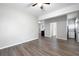 A spacious living room features sleek gray flooring, neutral walls, and modern ceiling fan with great natural light at 3078 Alberta Dr, Marietta, GA 30062