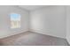 Neutral bedroom with carpet, window, and natural light at 2113 Dodson Woods Dr, Fairburn, GA 30213