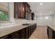 Kitchen features granite countertops, subway tile backsplash, stainless appliances, and gas cooktop at 2113 Dodson Woods Dr, Fairburn, GA 30213