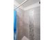 Modern bathroom with updated shower, featuring decorative vertical tile accent at 6220 Polar Fox Ct, Riverdale, GA 30296