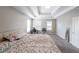 Spacious bedroom with plush carpet, neutral walls, and recessed lighting at 6220 Polar Fox Ct, Riverdale, GA 30296