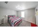 Bedroom with carpet floors, natural light, and neutral walls at 6220 Polar Fox Ct, Riverdale, GA 30296