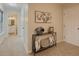 Hallway leading to bathroom featuring decoratively appointed wall and storage at 8007 Northcrest Dr, Jonesboro, GA 30238