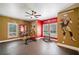 Finished basement with workout area and 49ers theming at 1064 Highway 20 E, Mcdonough, GA 30252
