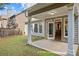 Cozy covered patio, perfect for outdoor relaxation and enjoying the backyard view at 1481 Wild Rye Ln, Grayson, GA 30017