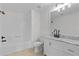 Bathroom featuring a combination shower and tub, large mirror, and vanity at 1481 Wild Rye Ln, Grayson, GA 30017