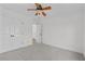 Bedroom featuring a ceiling fan, carpet flooring, and closet at 1481 Wild Rye Ln, Grayson, GA 30017