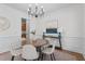 Bright dining room featuring a modern chandelier and stylish decor at 1481 Wild Rye Ln, Grayson, GA 30017