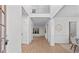 Elegant foyer with hardwood floors, natural light, and open access to the home at 1481 Wild Rye Ln, Grayson, GA 30017