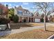 Beautifully landscaped home with a mix of brick and siding exterior at 1481 Wild Rye Ln, Grayson, GA 30017