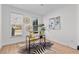 Well-lit home office with decorative zebra rug and woven wall art at 1481 Wild Rye Ln, Grayson, GA 30017