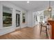 Cozy sunroom that overlooks backyard with great light and access to the living room at 1481 Wild Rye Ln, Grayson, GA 30017