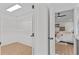 This walk-in closet provides ample storage space with custom shelving and modern lighting at 1481 Wild Rye Ln, Grayson, GA 30017